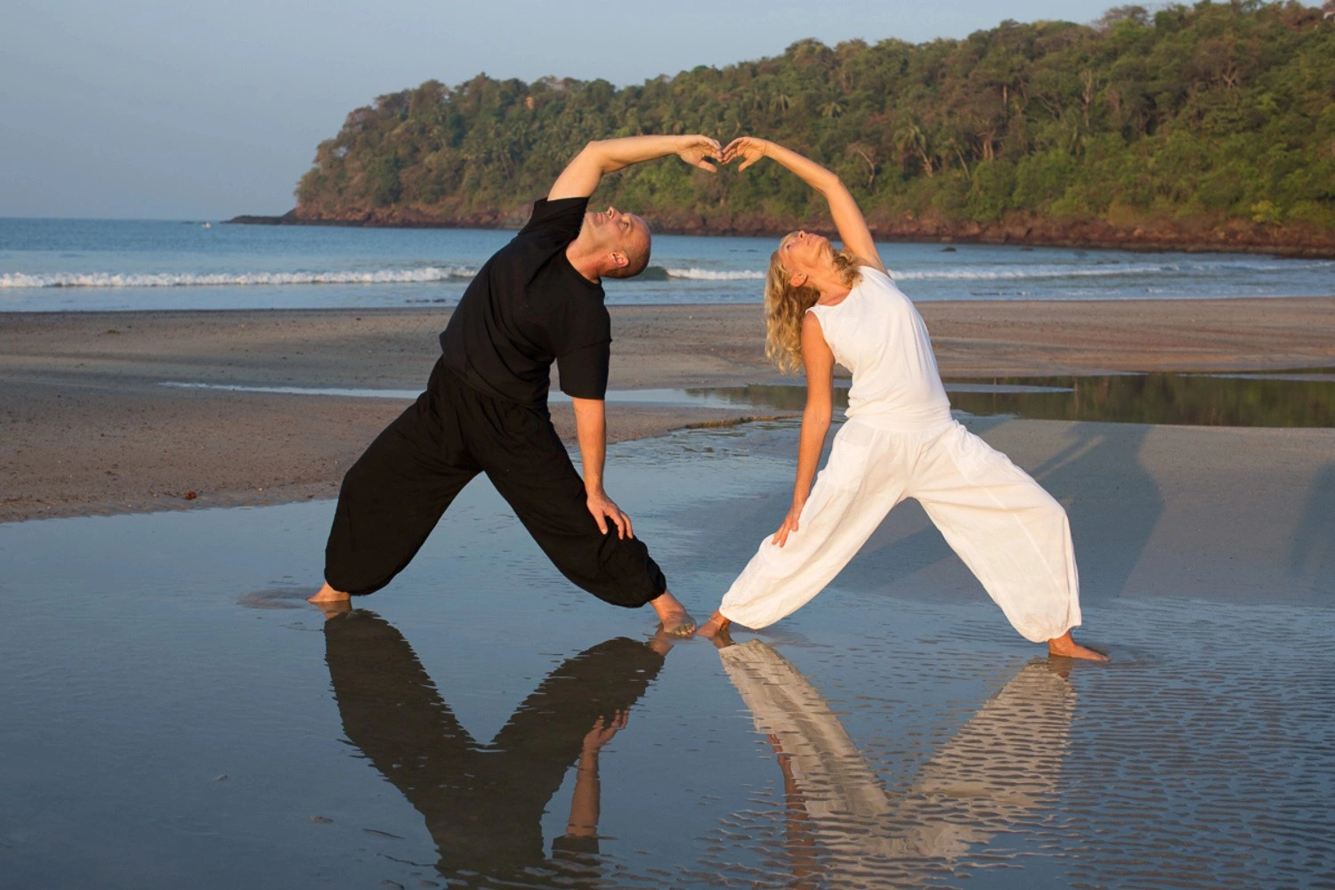 Guest stretching by the beach